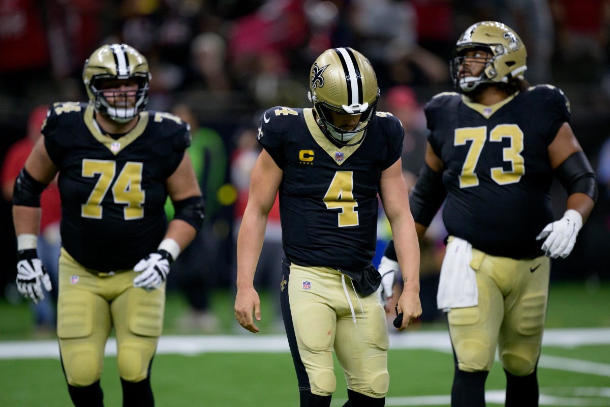 New Orleans Saints quarterback Derek Carr (4) reacts after being sacked and fumbling the ball against the Tampa Bay Buccaneers